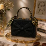 Maroon Bow Handbag with Gold Handle